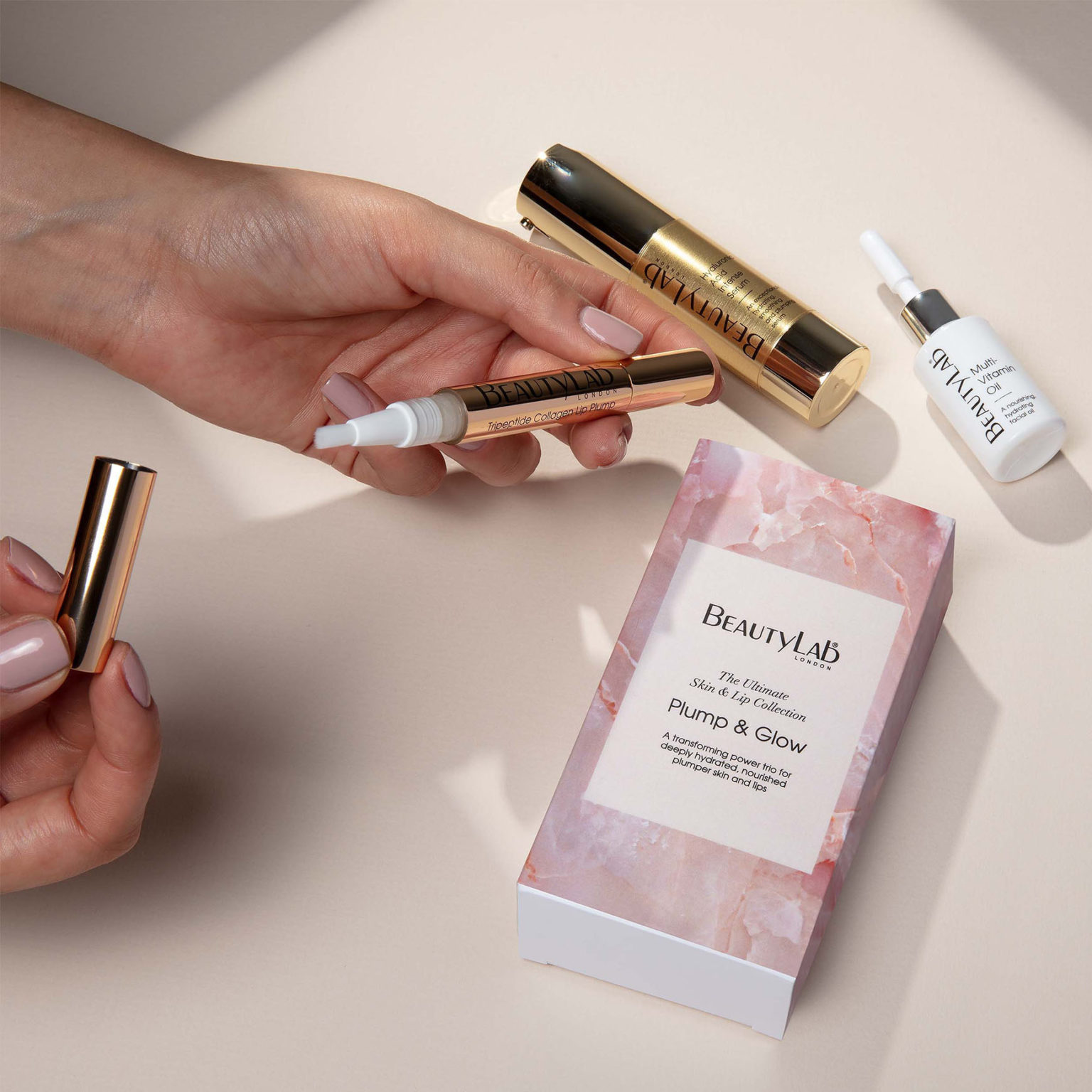 Plump & Glow The Ultimate Skin & Lip Collection - Hyaluronic Acid Intense Serum, model opening Tripeptide Collagen Lip Plump and Multi-Vitamin Oil