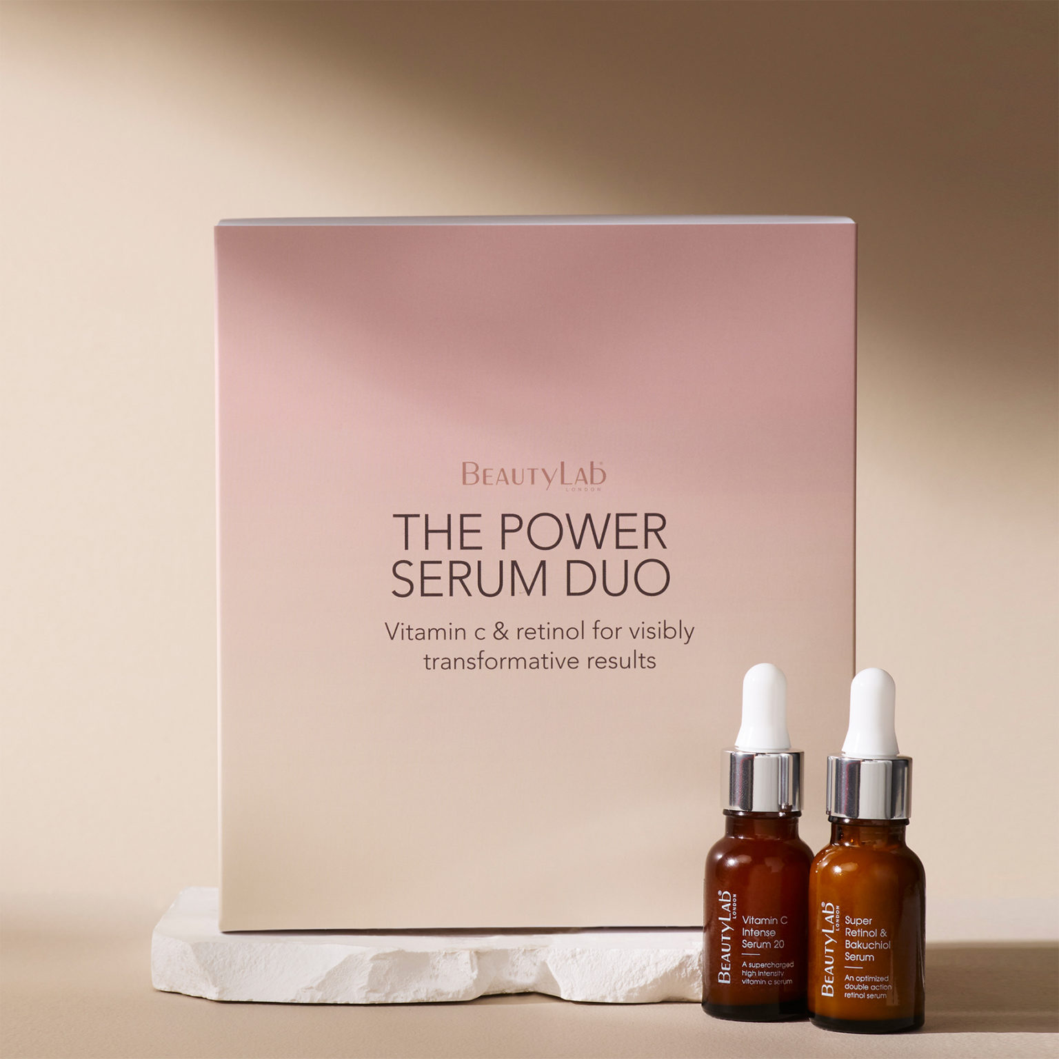 The Power Serum Duo- Vitamin C Intense Serum 20 and Super retinol & Bakuchiol Serum arrranged against a neutral background